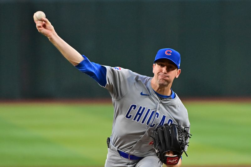 Apr 16, 2024; Phoenix, Arizona, USA; Chicago Cubs pitcher Kyle Hendricks (28) throws in the first inning against the Arizona Diamondbacks at Chase Field. Mandatory Credit: Matt Kartozian-USA TODAY Sports