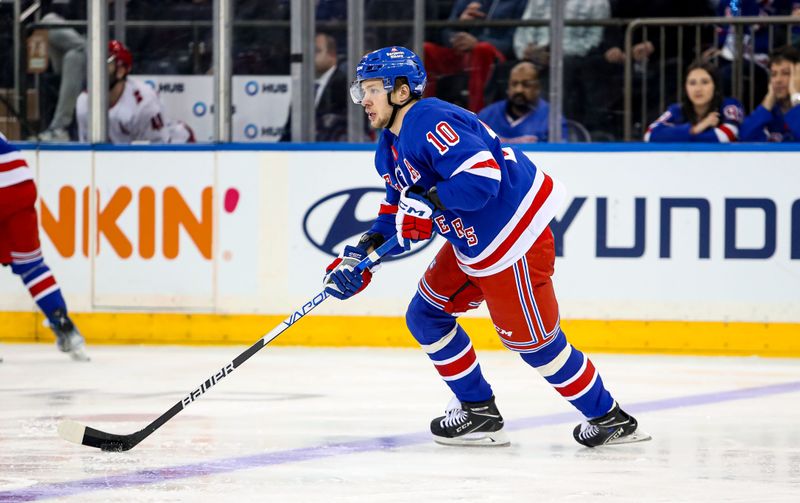 Jan 2, 2024; New York, New York, USA; New York Rangers left wing Artemi Panarin (10) looks to pass against the Carolina Hurricanes during the second period at Madison Square Garden. Mandatory Credit: Danny Wild-USA TODAY Sports