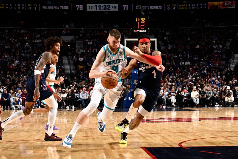 PHILADELPHIA, PA - MARCH 16: Davis Bertans #9 of the Charlotte Hornets handles the ball during the game against the Philadelphia 76ers on March 16, 2024 at the Wells Fargo Center in Philadelphia, Pennsylvania NOTE TO USER: User expressly acknowledges and agrees that, by downloading and/or using this Photograph, user is consenting to the terms and conditions of the Getty Images License Agreement. Mandatory Copyright Notice: Copyright 2024 NBAE (Photo by David Dow/NBAE via Getty Images)