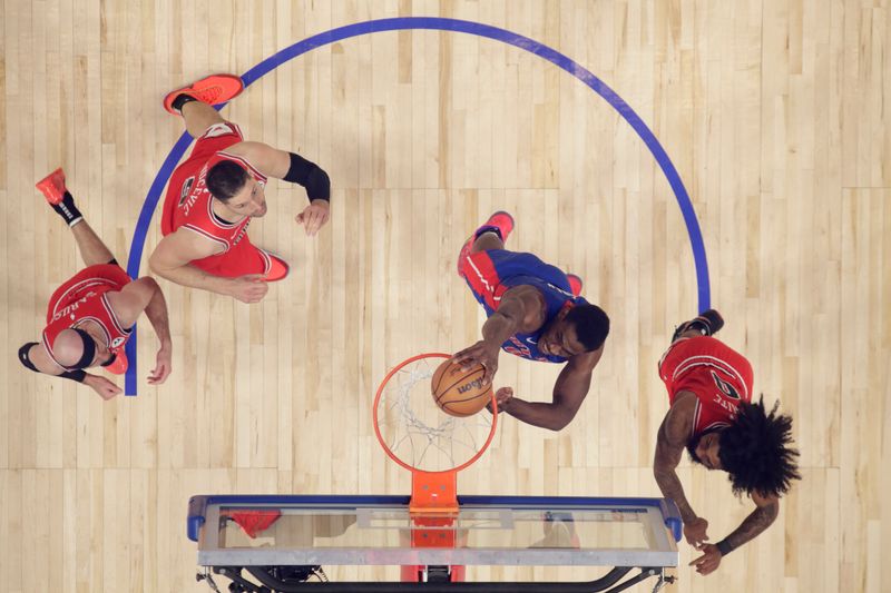 DETROIT, MI - APRIL 11: Jalen Duren #0 of the Detroit Pistons dunks the ball during the game against the Chicago Bulls on April 11, 2024 at Little Caesars Arena in Detroit, Michigan. NOTE TO USER: User expressly acknowledges and agrees that, by downloading and/or using this photograph, User is consenting to the terms and conditions of the Getty Images License Agreement. Mandatory Copyright Notice: Copyright 2024 NBAE (Photo by Brian Sevald/NBAE via Getty Images)