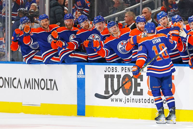 Jan 16, 2024; Edmonton, Alberta, CAN; The Edmonton Oilers celebrate a goal scored by forward Derek Ryan (10) during the third period against the Toronto Maple Leafs at Rogers Place. Mandatory Credit: Perry Nelson-USA TODAY Sports