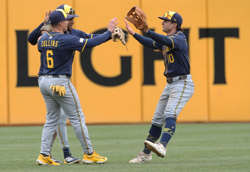 May 25, 2025; Pittsburgh, Pennsylvania, USA;  Milwaukee Brewers left fielder Isaac Collins (6) and center fielder Jackson Chourio (middle) and right fielder Sal Frelick (10) celebrate in the outfield after defeating the Pittsburgh Pirates at PNC Park. Mandatory Credit: Charles LeClaire-Imagn Images