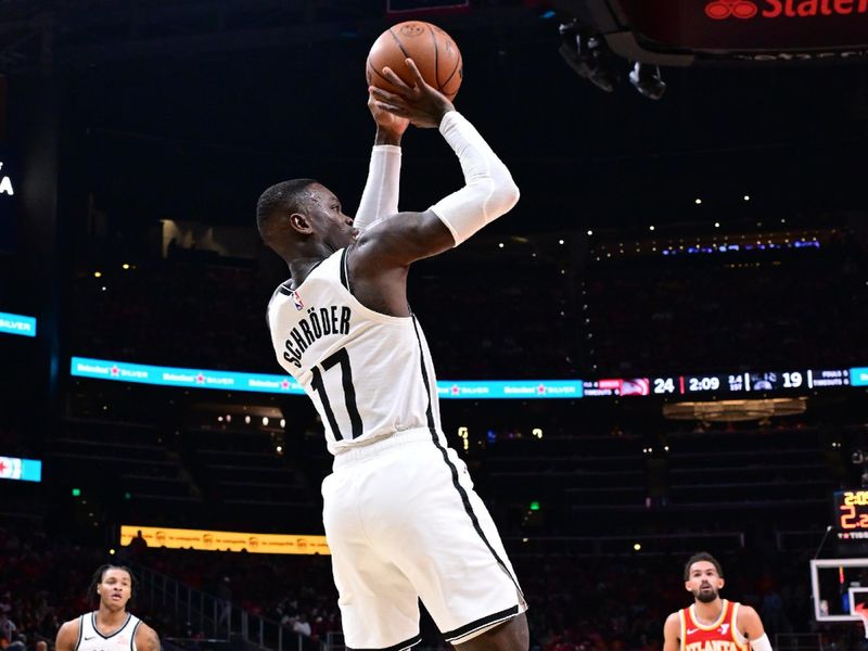 PORTLAND, OR - OCTOBER 23: Dennis Schroder #17 of the Brooklyn Nets shoots the ball during the game against the Atlanta Hawks on October 23, 2024 at the Moda Center Arena in Portland, Oregon. NOTE TO USER: User expressly acknowledges and agrees that, by downloading and or using this photograph, user is consenting to the terms and conditions of the Getty Images License Agreement. Mandatory Copyright Notice: Copyright 2024 NBAE (Photo by Cameron Browne/NBAE via Getty Images)