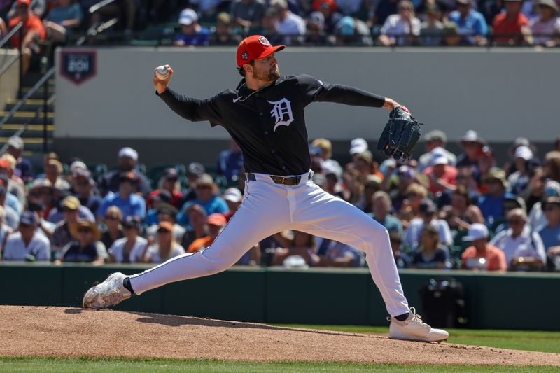 Mar 14, 2024; Lakeland, Florida, USA; Detroit Tigers starting pitcher Casey Mize (12) pitches during the first inning against the New York Yankees at Publix Field at Joker Marchant Stadium. Mandatory Credit: Mike Watters-USA TODAY Sports