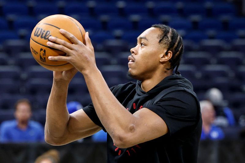 ORLANDO, FL - MARCH 4: Scottie Barnes #4 of the Toronto Raptors warms up prior to the game against the Orlando Magic at the Kia Center on March 4, 2025 in Orlando, Florida. NOTE TO USER: User expressly acknowledges and agrees that, by downloading and or using this photograph, User is consenting to the terms and conditions of the Getty Images License Agreement. (Photo by Don Juan Moore/Getty Images)