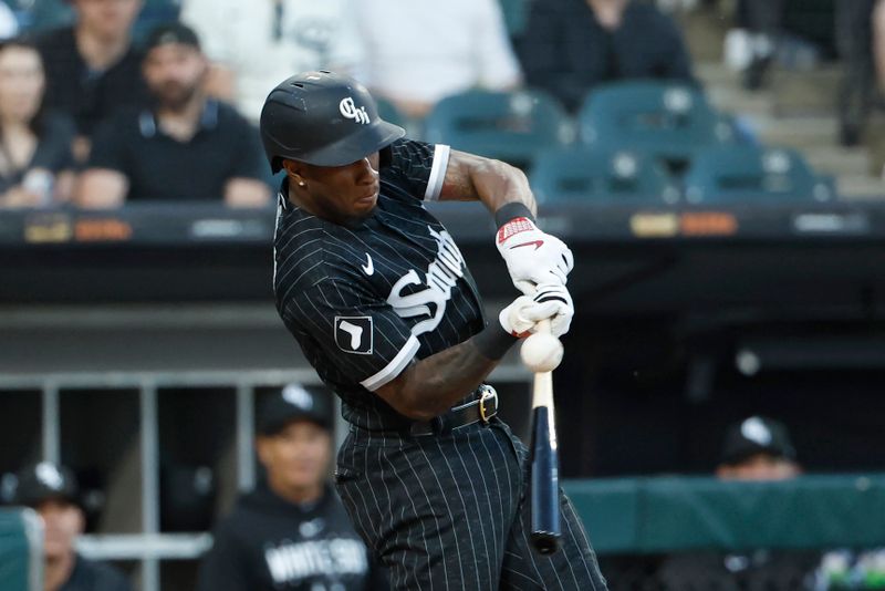 Jun 9, 2023; Chicago, Illinois, USA; Chicago White Sox shortstop Tim Anderson (7) singles against the Miami Marlins during the third inning at Guaranteed Rate Field. Mandatory Credit: Kamil Krzaczynski-USA TODAY Sports