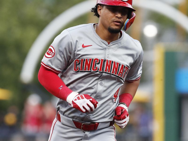 Jun 18, 2024; Pittsburgh, Pennsylvania, USA;  Cincinnati Reds third baseman Santiago Espinal (4) circles the bases on a two run home run against the Pittsburgh Pirates during the fifth inning at PNC Park. Mandatory Credit: Charles LeClaire-USA TODAY Sports