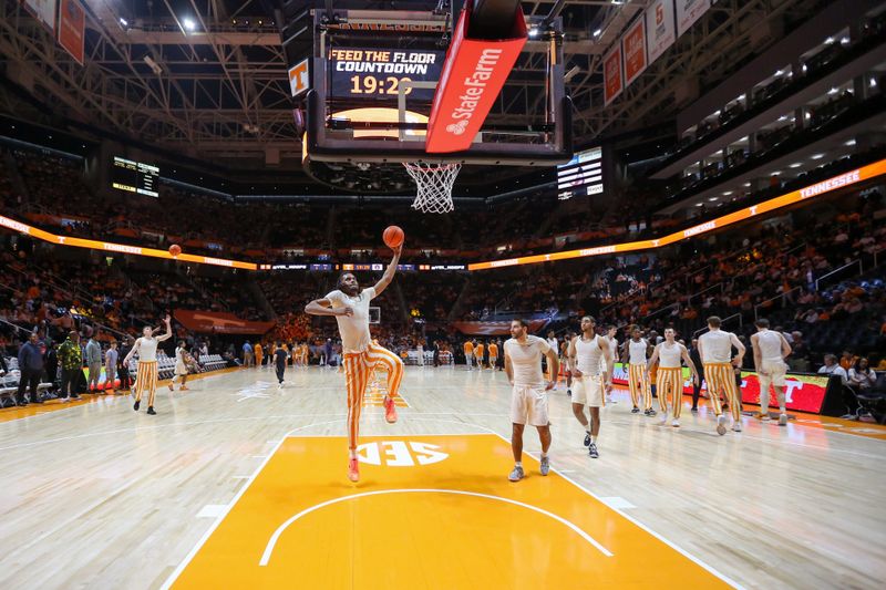 Feb 28, 2024; Knoxville, Tennessee, USA; The Tennessee Volunteers warms up before the game against the Auburn Tigers at Thompson-Boling Arena at Food City Center. Mandatory Credit: Randy Sartin-USA TODAY Sports