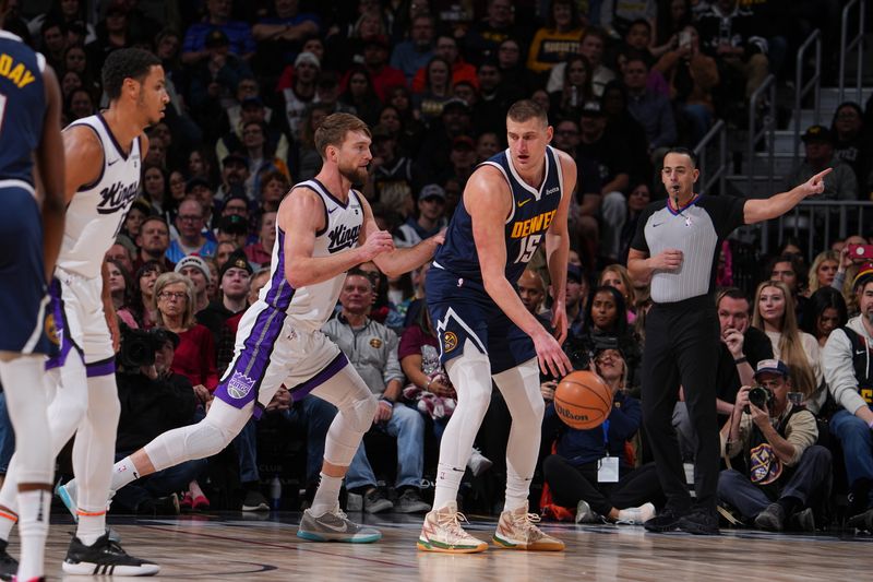 DENVER, CO - FEBRUARY 14: Nikola Jokic #15 of the Denver Nuggets dribbles the ball during the game against the Sacramento Kings on February 14, 2024 at the Ball Arena in Denver, Colorado. NOTE TO USER: User expressly acknowledges and agrees that, by downloading and/or using this Photograph, user is consenting to the terms and conditions of the Getty Images License Agreement. Mandatory Copyright Notice: Copyright 2024 NBAE (Photo by Bart Young/NBAE via Getty Images)