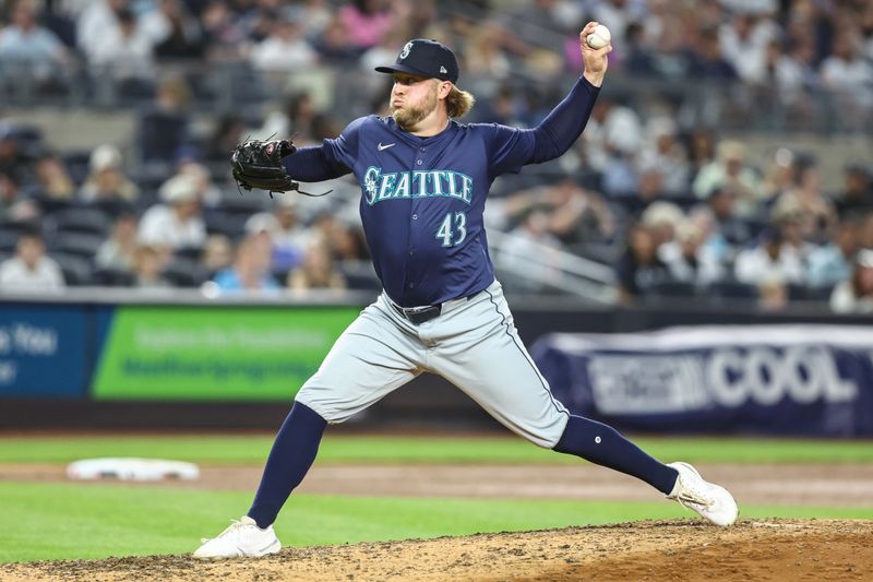 May 22, 2024; Bronx, New York, USA;  Seattle Mariners pitcher Kirby Snead (43) pitches in the seventh inning against the New York Yankees at Yankee Stadium. Mandatory Credit: Wendell Cruz-USA TODAY Sports