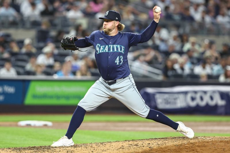 May 22, 2024; Bronx, New York, USA;  Seattle Mariners pitcher Kirby Snead (43) pitches in the seventh inning against the New York Yankees at Yankee Stadium. Mandatory Credit: Wendell Cruz-USA TODAY Sports