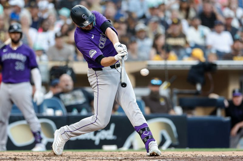 Aug 3, 2024; San Diego, California, USA; Colorado Rockies designated hitter Kris Bryant (23) hits a double against the San Diego Padres during the seventh inning at Petco Park. Mandatory Credit: David Frerker-USA TODAY Sports