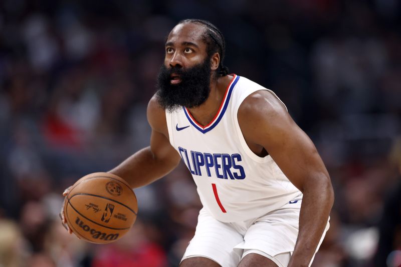 LOS ANGELES, CALIFORNIA - FEBRUARY 25: James Harden #1 of the Los Angeles Clippers brings the ball up court during the second quarter against the Sacramento Kings at Crypto.com Arena on February 25, 2024 in Los Angeles, California. The Sacramento Kings defeated the Los Angeles Clippers 123-107. NOTE TO USER: User expressly acknowledges and agrees that, by downloading and or using this photograph, User is consenting to the terms and conditions of the Getty Images License Agreement. (Photo by Katelyn Mulcahy/Getty Images)