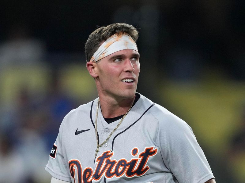 Sep 20, 2023; Los Angeles, California, USA; Detroit Tigers right fielder Kerry Carpenter (30) reacts after scoring against the Los Angeles Dodgers in the eighth inning at Dodger Stadium. Mandatory Credit: Kirby Lee-USA TODAY Sports