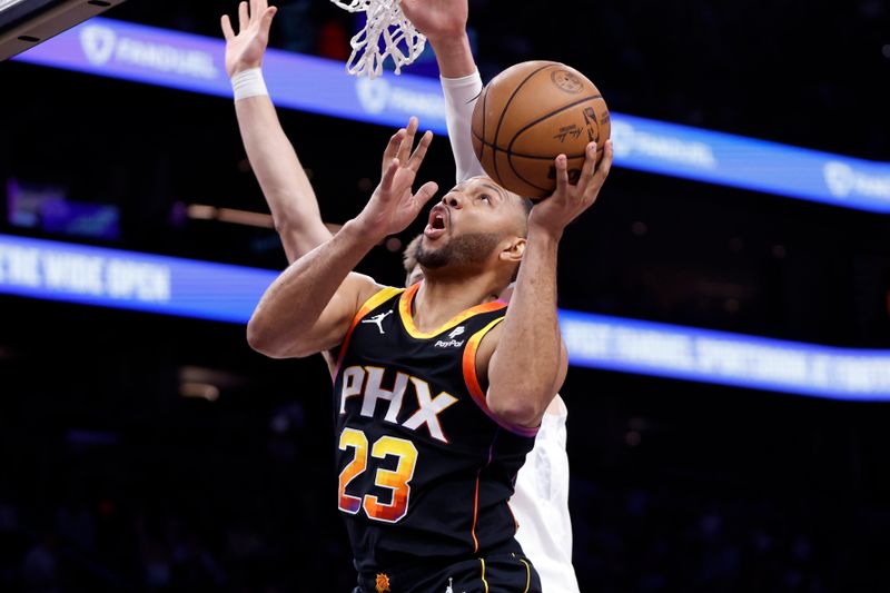 PHOENIX, ARIZONA - FEBRUARY 08: Eric Gordon #23 of the Phoenix Suns attempts a layup during the first half against the Utah Jazz at Footprint Center on February 08, 2024 in Phoenix, Arizona. NOTE TO USER: User expressly acknowledges and agrees that, by downloading and or using this photograph, User is consenting to the terms and conditions of the Getty Images License Agreement.  (Photo by Chris Coduto/Getty Images)