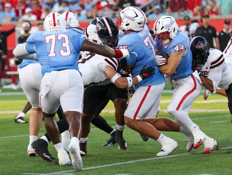 Oct 4, 2025; Houston, Texas, USA; Houston Cougars running back Dean Connors (44) rushes against the Texas Tech Raiders in the first half at TDECU Stadium. Mandatory Credit: Thomas Shea-Imagn Images