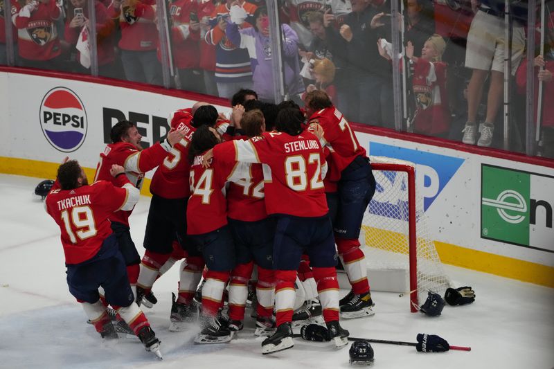 Jun 24, 2024; Sunrise, Florida, USA; Florida Panthers celebrate winning against the Edmonton Oilers in game seven of the 2024 Stanley Cup Final at Amerant Bank Arena. Mandatory Credit: Jim Rassol-USA TODAY Sports