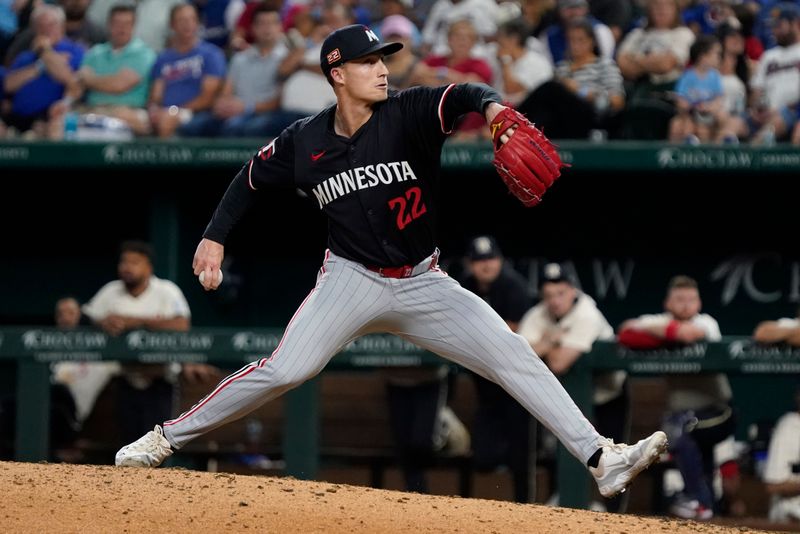 Aug 16, 2024; Arlington, Texas, USA; Minnesota Twins pitcher Griffin Jax (22) throws to the plate during the eighth inning against the Texas Rangers at Globe Life Field. Mandatory Credit: Raymond Carlin III-USA TODAY Sports