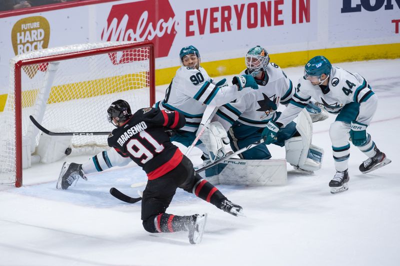 Jan 13, 2024; Ottawa, Ontario, CAN; Ottawa Senators right wing Vladimir Tarasenko (91) scores the game winning goal against San Jose Sharks goalie Mackenzie Blackwood (29) in the third period at the Canadian Tire Centre. Mandatory Credit: Marc DesRosiers-USA TODAY Sports