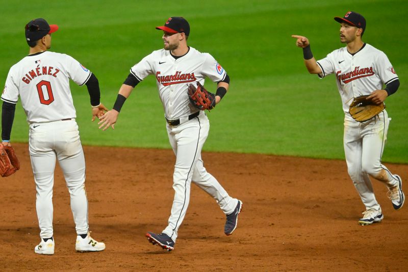 Aug 14, 2024; Cleveland, Ohio, USA; The Cleveland Guardians celebrate a win over the Chicago Cubs at Progressive Field. Mandatory Credit: David Richard-USA TODAY Sports