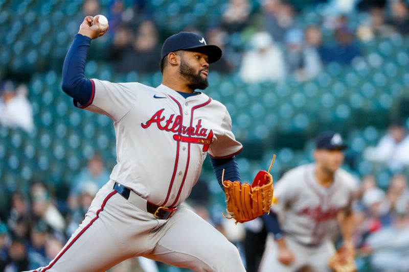 Apr 30, 2024; Seattle, Washington, USA; Atlanta Braves starting pitcher Reynaldo Lopez (40) throws against the Seattle Mariners during the first inning at T-Mobile Park. Mandatory Credit: Joe Nicholson-USA TODAY Sports