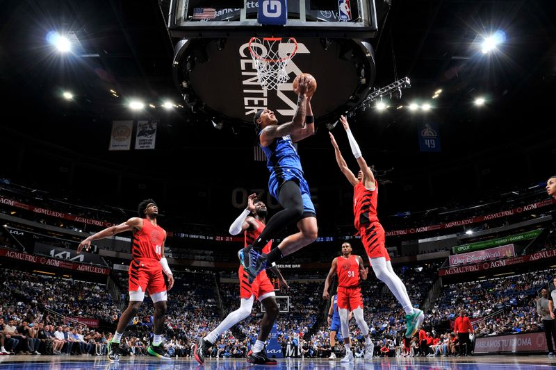 ORLANDO, FL - APRIL 1: Paolo Banchero #5 of the Orlando Magic drives to the basket during the game against the Portland Trail Blazers on April 1, 2024 at Kia Center in Orlando, Florida. NOTE TO USER: User expressly acknowledges and agrees that, by downloading and or using this photograph, User is consenting to the terms and conditions of the Getty Images License Agreement. Mandatory Copyright Notice: Copyright 2024 NBAE (Photo by Fernando Medina/NBAE via Getty Images)