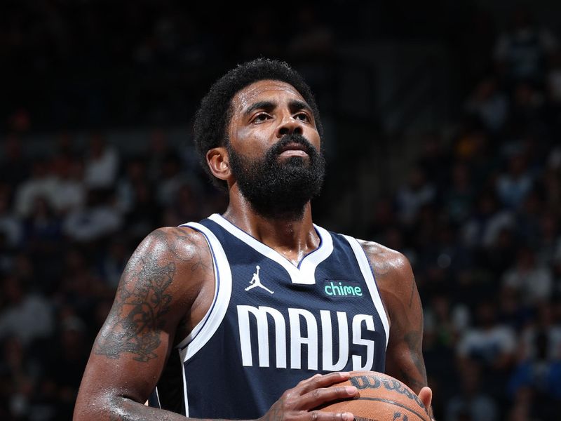 MINNEAPOLIS, MN -  OCTOBER 29: Kyrie Irving #11 of the Dallas Mavericks shoots a free throw during the game against the Minnesota Timberwolves on October 29, 2024 at Target Center in Minneapolis, Minnesota. NOTE TO USER: User expressly acknowledges and agrees that, by downloading and or using this Photograph, user is consenting to the terms and conditions of the Getty Images License Agreement. Mandatory Copyright Notice: Copyright 2024 NBAE (Photo by David Sherman/NBAE via Getty Images)