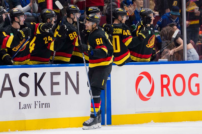 Dec 23, 2023; Vancouver, British Columbia, CAN; Vancouver Canucks forward Dakota Joshua (81) celebrates his goal against the San Jose Sharks in the second period at Rogers Arena. Mandatory Credit: Bob Frid-USA TODAY Sports