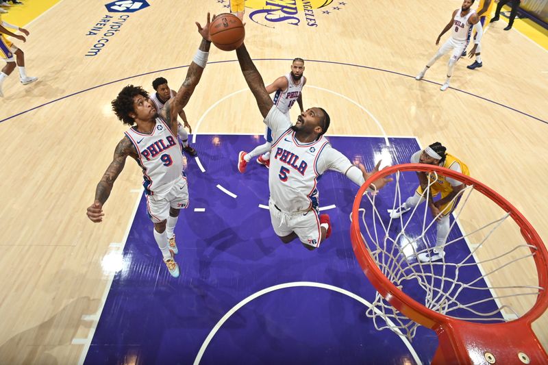 LOS ANGELES, CA - NOVEMBER 8: Andre Drummond #5 of the Philadelphia 76ers goes up for the rebound during the game against the Los Angeles Lakers on Novemberr 8, 2024 at Crypto.Com Arena in Los Angeles, California. NOTE TO USER: User expressly acknowledges and agrees that, by downloading and/or using this Photograph, user is consenting to the terms and conditions of the Getty Images License Agreement. Mandatory Copyright Notice: Copyright 2024 NBAE (Photo by Adam Pantozzi/NBAE via Getty Images)