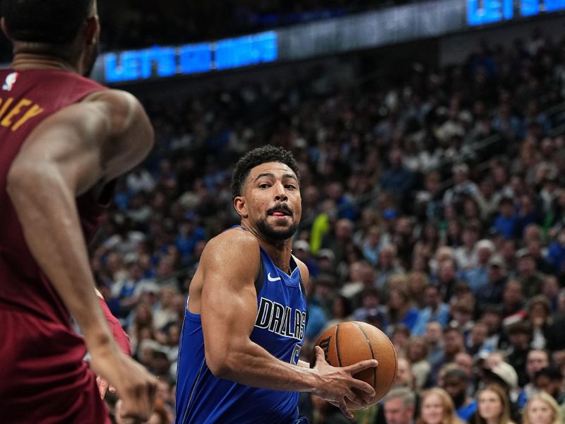 DALLAS, TX - JANUARY 03:  Quentin Grimes #5 of the Dallas Mavericks drives to the basket during the game against the Cleveland Cavaliers on January 3, 2025 at American Airlines Center in Dallas, Texas. NOTE TO USER: User expressly acknowledges and agrees that, by downloading and or using this photograph, User is consenting to the terms and conditions of the Getty Images License Agreement. Mandatory Copyright Notice: Copyright 2025 NBAE (Photo by Glenn James/NBAE via Getty Images)