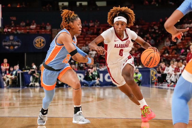 Mar 8, 2024; Greensville, SC, USA; Alabama Crimson Tide guard Loyal McQueen (0) drives to the basket against Tennessee Lady Vols guard Jasmine Powell (15) during the first half at Bon Secours Wellness Arena. Mandatory Credit: Jim Dedmon-USA TODAY Sports