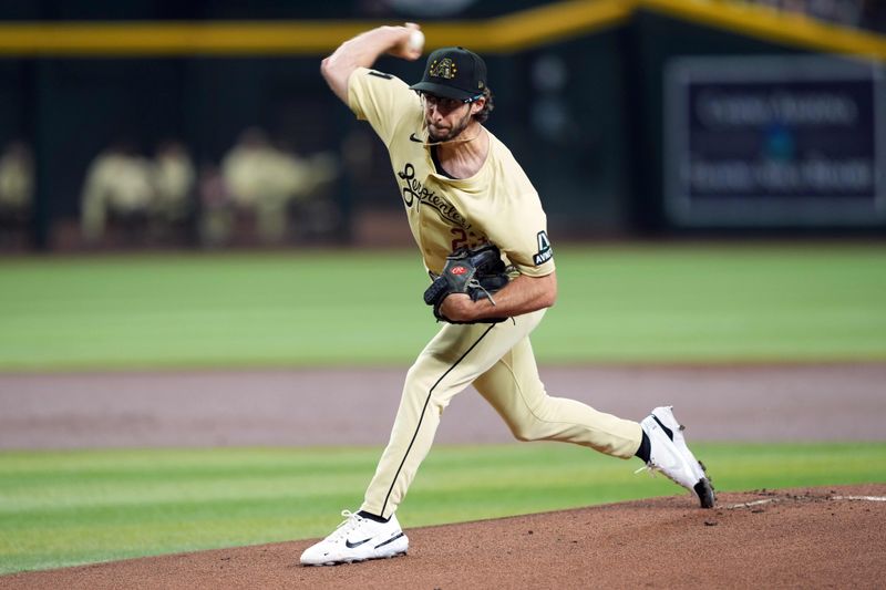 May 18, 2024; Phoenix, Arizona, USA; Arizona Diamondbacks pitcher Zac Gallen (23) pitches against the Detroit Tigers during the first inning at Chase Field. Mandatory Credit: Joe Camporeale-USA TODAY Sports