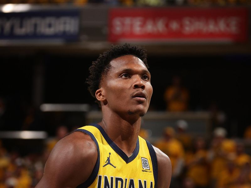 INDIANAPOLIS, IN - MAY 27:   Bennedict Mathurin #00 of the Indiana Pacers shoots a free throw during the game against the New York Knicks during Game 4 of the 2025 Eastern Conference Finals on May 27, 2025 at Gainbridge Fieldhouse in Indianapolis, Indiana. NOTE TO USER: User expressly acknowledges and agrees that, by downloading and or using this Photograph, user is consenting to the terms and conditions of the Getty Images License Agreement. Mandatory Copyright Notice: Copyright 2025 NBAE (Photo by Nathaniel S. Butler/NBAE via Getty Images)