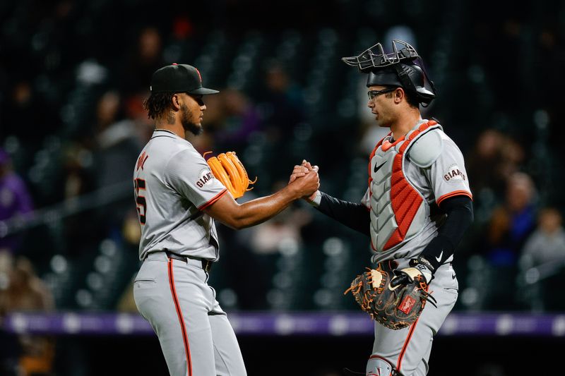 May 7, 2024; Denver, Colorado, USA; San Francisco Giants relief pitcher Camilo Doval (75) celebrates with catcher Blake Sabol (21) after the game against the Colorado Rockies at Coors Field. Mandatory Credit: Isaiah J. Downing-USA TODAY Sports