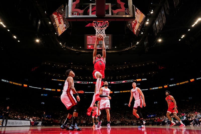 TORONTO, CANADA - JANUARY 17: Scottie Barnes #4 of the Toronto Raptors drives to the basket during the game against the Miami Heat on January 17, 2024 at the Scotiabank Arena in Toronto, Ontario, Canada.  NOTE TO USER: User expressly acknowledges and agrees that, by downloading and or using this Photograph, user is consenting to the terms and conditions of the Getty Images License Agreement.  Mandatory Copyright Notice: Copyright 2024 NBAE (Photo by Mark Blinch/NBAE via Getty Images)