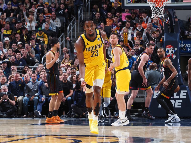 INDIANAPOLIS, IN - JANUARY 26: Aaron Nesmith #23 of the Indiana Pacers celebrates during the game against the Phoenix Suns on January 26, 2024 at Gainbridge Fieldhouse in Indianapolis, Indiana. NOTE TO USER: User expressly acknowledges and agrees that, by downloading and or using this Photograph, user is consenting to the terms and conditions of the Getty Images License Agreement. Mandatory Copyright Notice: Copyright 2024 NBAE (Photo by Ron Hoskins/NBAE via Getty Images)