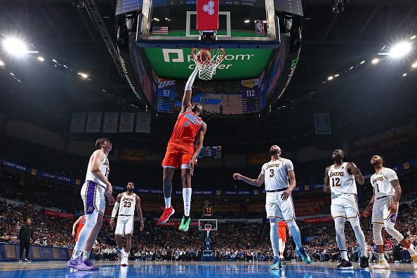 OKLAHOMA CITY, OK - DECEMBER 23: Jalen Williams #8 of the Oklahoma City Thunder dunks the ball during the game against the Los Angeles Lakers on December 23, 2023 at Paycom Arena in Oklahoma City, Oklahoma. NOTE TO USER: User expressly acknowledges and agrees that, by downloading and or using this photograph, User is consenting to the terms and conditions of the Getty Images License Agreement. Mandatory Copyright Notice: Copyright 2023 NBAE (Photo by Zach Beeker/NBAE via Getty Images)