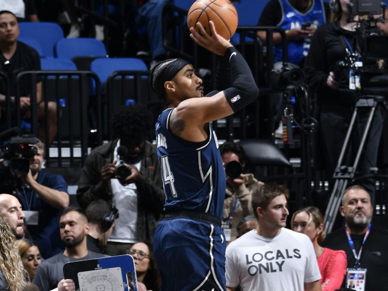 ORLANDO, FL - MARCH 21: Gary Harris #14 of the Orlando Magic shoots the ball during the game against the New Orleans Pelicans on March 21, 2024 at Amway Center in Orlando, Florida. NOTE TO USER: User expressly acknowledges and agrees that, by downloading and or using this photograph, User is consenting to the terms and conditions of the Getty Images License Agreement. Mandatory Copyright Notice: Copyright 2024 NBAE (Photo by Fernando Medina/NBAE via Getty Images)