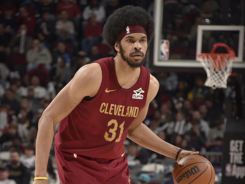 CLEVELAND, OH - FEBRUARY 23: Jarrett Allen #31 of the Cleveland Cavaliers dribbles the ball during the game against the Memphis Grizzlies on February 23 , 2025 at Rocket Arena in Cleveland, Ohio. NOTE TO USER: User expressly acknowledges and agrees that, by downloading and/or using this Photograph, user is consenting to the terms and conditions of the Getty Images License Agreement. Mandatory Copyright Notice: Copyright 2025 NBAE (Photo by David Liam Kyle/NBAE via Getty Images)