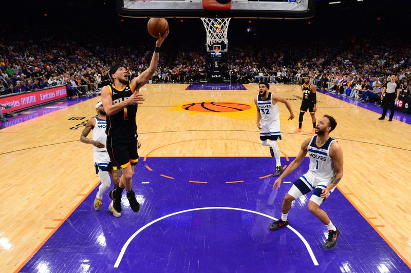 PHOENIX, AZ - APRIL  28: Devin Booker #1 of the Phoenix Suns shoots the ball during the game against the Minnesota Timberwolves during Round 1 Game 4 of the 2024 NBA Playoffs on April 28, 2024 at Footprint Center in Phoenix, Arizona. NOTE TO USER: User expressly acknowledges and agrees that, by downloading and or using this photograph, user is consenting to the terms and conditions of the Getty Images License Agreement. Mandatory Copyright Notice: Copyright 2024 NBAE (Photo by Kate Frese/NBAE via Getty Images)