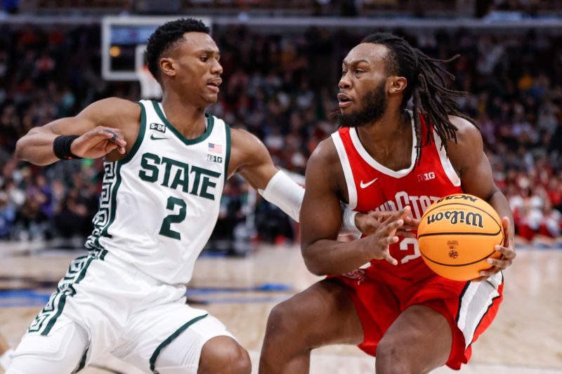 Mar 10, 2023; Chicago, IL, USA; Ohio State Buckeyes guard Bruce Thornton (2) drives to the basket against Michigan State Spartans guard Tyson Walker (2) during the first half at United Center. Mandatory Credit: Kamil Krzaczynski-USA TODAY Sports