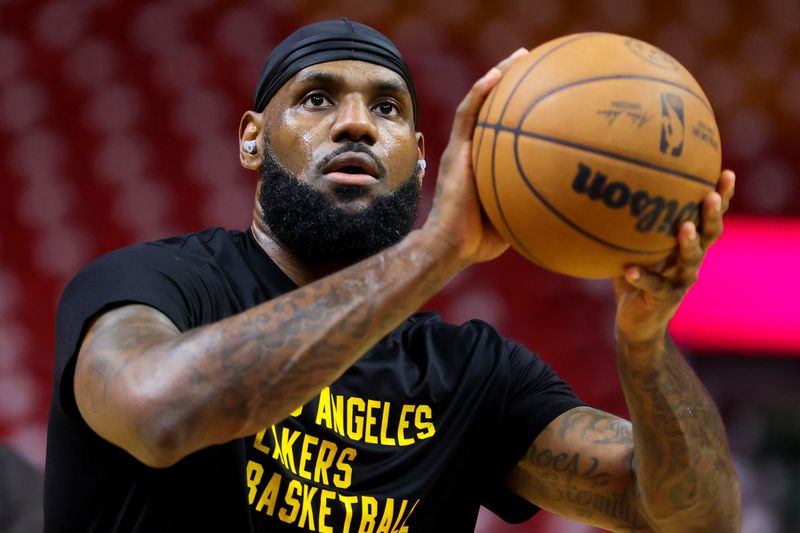 MIAMI, FLORIDA - NOVEMBER 06: LeBron James #23 of the Los Angeles Lakers warms up prior to a game against the Miami Heat at Kaseya Center on November 06, 2023 in Miami, Florida. NOTE TO USER: User expressly acknowledges and agrees that, by downloading and or using this photograph, User is consenting to the terms and conditions of the Getty Images License Agreement. (Photo by Megan Briggs/Getty Images)