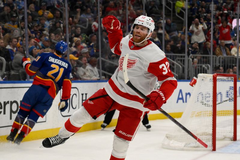 Apr 1, 2025; St. Louis, Missouri, USA; Detroit Red Wings left wing J.T. Compher (37) reacts after scoring a goal against the St. Louis Blues during the third period at Enterprise Center. Mandatory Credit: Jeff Le-Imagn Images