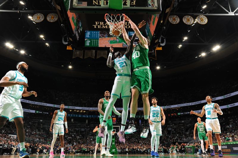 BOSTON, MA - APRIL 12: Luke Kornet #40 of the Boston Celtics dunks the ball during the game against the Charlotte Hornets on April 12, 2024 at the TD Garden in Boston, Massachusetts. NOTE TO USER: User expressly acknowledges and agrees that, by downloading and or using this photograph, User is consenting to the terms and conditions of the Getty Images License Agreement. Mandatory Copyright Notice: Copyright 2024 NBAE  (Photo by Brian Babineau/NBAE via Getty Images)