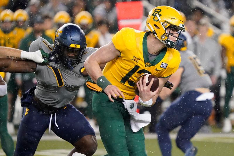 Nov 25, 2023; Waco, Texas, USA; Baylor Bears quarterback Sawyer Robertson (13) carries the ball against the West Virginia Mountaineers during the first half at McLane Stadium. Mandatory Credit: Raymond Carlin III-USA TODAY Sports