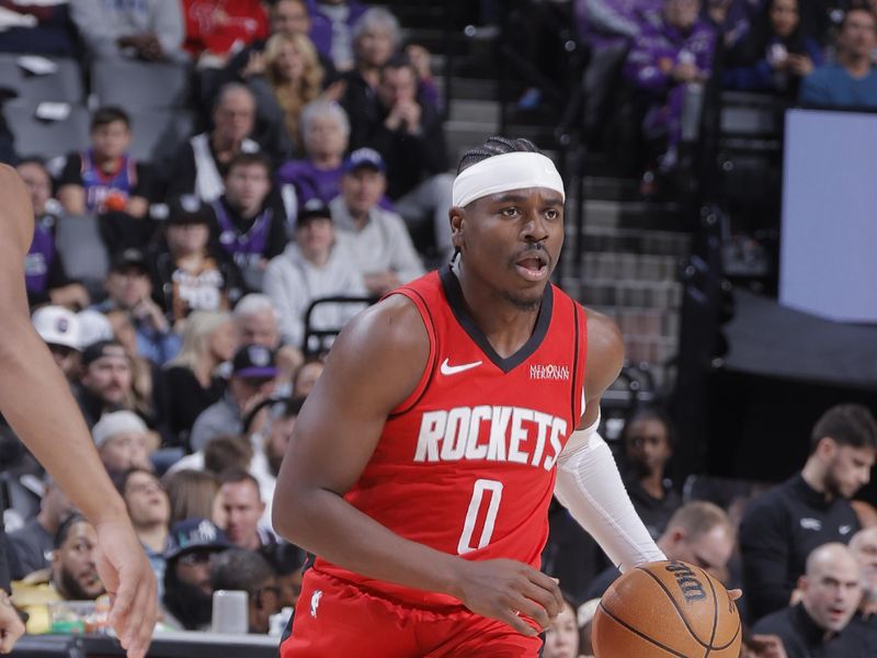 SACRAMENTO, CA - JANUARY 16: Aaron Holiday #0 of the Houston Rockets dribbles the ball during the game against the Sacramento Kings on January 16, 2025 at Golden 1 Center in Sacramento, California. NOTE TO USER: User expressly acknowledges and agrees that, by downloading and or using this Photograph, user is consenting to the terms and conditions of the Getty Images License Agreement. Mandatory Copyright Notice: Copyright 2025 NBAE (Photo by Rocky Widner/NBAE via Getty Images)