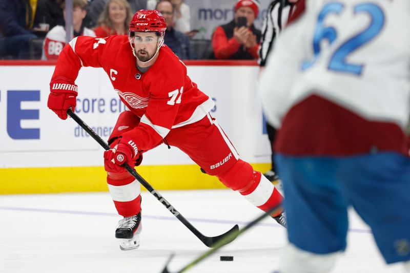 Feb 22, 2024; Detroit, Michigan, USA;  Detroit Red Wings center Dylan Larkin (71) skates with the puck in the second period against the Colorado Avalanche at Little Caesars Arena. Mandatory Credit: Rick Osentoski-USA TODAY Sports