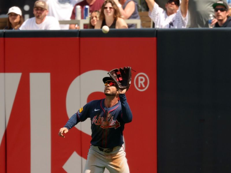 Mar 10, 2024; Tampa, Florida, USA; Atlanta Braves left fielder Forrest Wall (73) catches a fly ball during the third inning against the New York Yankeesat George M. Steinbrenner Field. Mandatory Credit: Kim Klement Neitzel-USA TODAY Sports