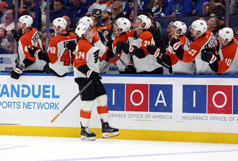 Nov 7, 2024; Tampa, Florida, USA; Philadelphia Flyers right wing Owen Tippett (74) celebrates after scoring a goal against the Tampa Bay Lightning during the third period at Amalie Arena. Mandatory Credit: Kim Klement Neitzel-Imagn Images