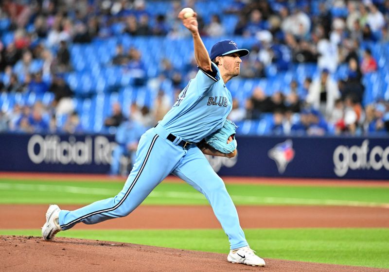 Sep 14, 2023; Toronto, Ontario, CAN;   Toronto Blue Jays starting pitcher Kevin Gausman (34) delivers a pitch against the Texas Rangers in the first inning at Rogers Centre. Mandatory Credit: Dan Hamilton-USA TODAY Sports